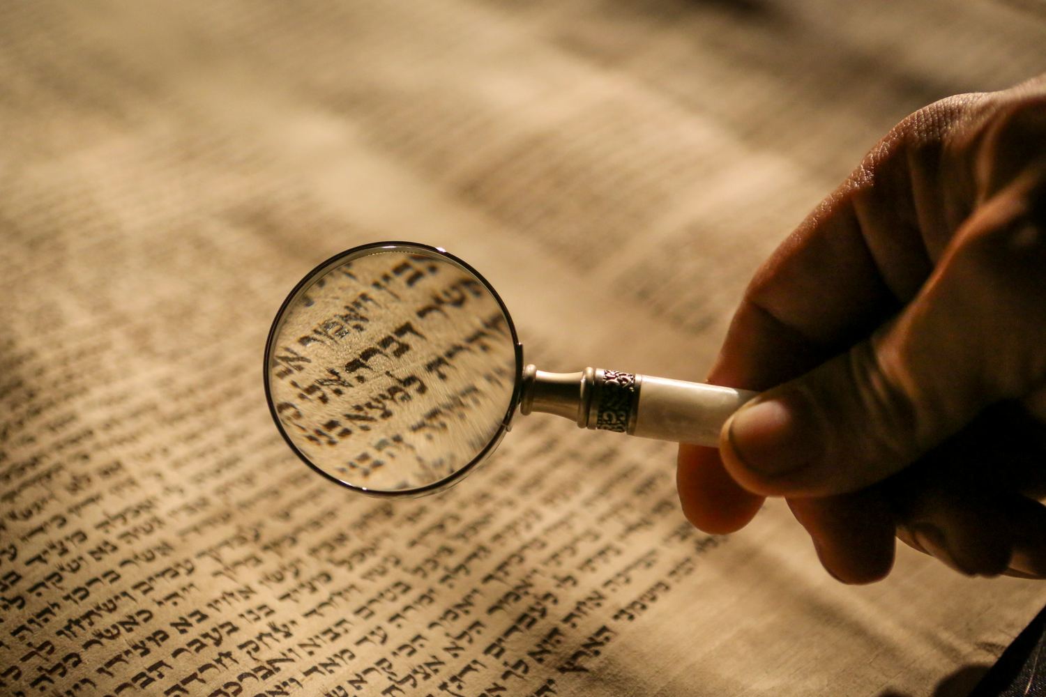Rows of Hebrew letters cast in metal printing type.